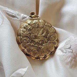 Vintage gold tone makeup compact circa 1970s beautiful bird motif
